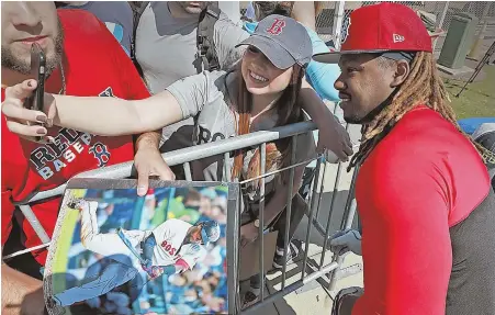  ?? STAFF PHOTO BY MATT STONE ?? STRIKE A POSE: Hanley Ramirez leans in for a selfie yesterday in Fort Myers.