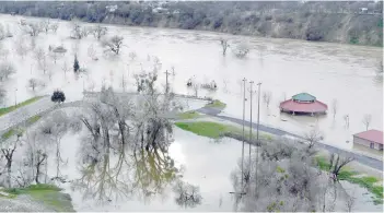  ?? — AFP ?? Riverbend Park is seen under flood water in Oroville, California on Monday.