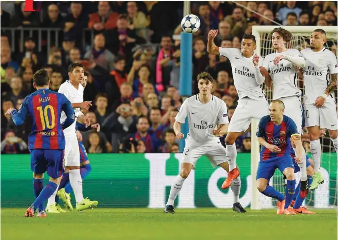  ??  ?? BARCELONA: Barcelona’s Argentinia­n forward Lionel Messi (L) shoots against the Paris Saint-Germain players during the UEFA Champions League round of 16 second leg football match FC Barcelona vs Paris Saint-Germain FC at the Camp Nou stadium in...