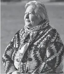  ?? LOGAN MACLEAN • THE GUARDIAN ?? Methilda Knockwood-snache, a Mi’kmaq elder, plays the Mi’kmaq Honour song at a ceremony before the launch of the moderate livelihood fishery.