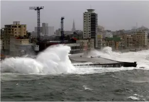  ?? Reuters ?? Waves crash against the seafront boulevard El Malecon in Havana, Cuba. —