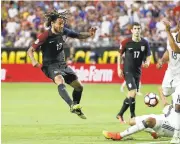  ?? CHRISTIAN PETERSEN/GETTY IMAGES ?? Jermaine Jones of United States shoots the ball against Frank Fabra of Colombia during the second half.