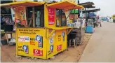  ?? ?? A mobile money kiosk in Accra, Ghana.
Photo: Nipah Dennis/getty Images