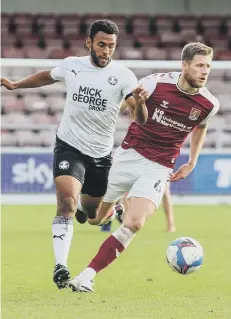  ??  ?? Nathan Thompson in action for Posh at Cobblers.