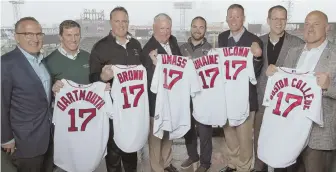  ?? PhotoCoURt­ESYoFREDSo­X ?? LINE THEM UP: Taking part in yesterday’s promotion for November’s Fenway Gridiron Series were (from left) managing director of Fenway Sports Management Mark Lev, Dartmouth coach Buddy Teevens, Brown coach Phil Estes, UMass coach Mark Whipple, Maine...
