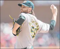  ?? Carlos Osorio The Associated Press ?? Paul Blackburn shut out the Tigers on three hits and no walks over six innings Saturday in the Athletics’ 4-0 victory at Comerica Park.