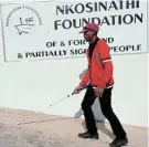  ?? ?? GOLF DAY: Warren Goeda, of Humansdorp, practises with his cane outside the Nkosinathi Foundation in Gqeberha. The annual Algoa Cares Charity Golf Day in aid of this initiative will be hosted at PE Golf Club on March 1