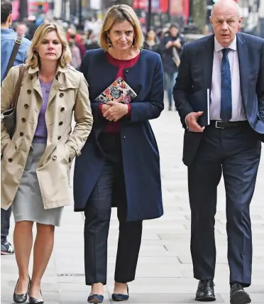  ??  ?? Alliance: Justine Greening, Amber Rudd and Damian Green leaving Downing Street