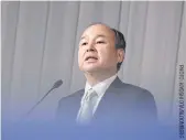  ??  ?? LEFT
Masayoshi Son, chairman and chief executive officer of SoftBank Group, speaks during a news conference in Tokyo, in February 2021.