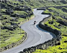  ??  ?? Alive with the sound of motors: the Llanberis Pass in Snowdonia is popular with bikers