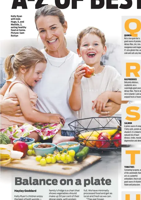  ?? ?? Kelly Ryan with kids Hugo, 5, and Matilda, 2, eating healthy food at home. Picture: Sam Ruttyn