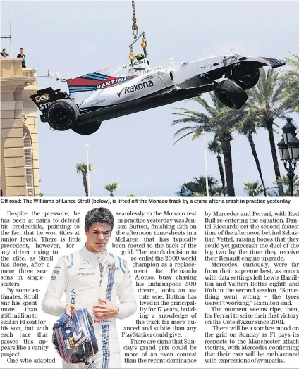  ??  ?? Off road: The Williams of Lance Stroll (below), is lifted off the Monaco track by a crane after a crash in practice yesterday