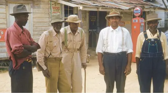  ?? NATIONAL ARCHIVES ?? Men included in the Public Health Service syphilis study stand for a photo in 1950s Alabama. The study began in 1932 and went on for 40 years, enrolling some 600 Black men.