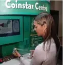  ?? JONATHAN HAYWARD/THE CANADIAN PRESS ?? The coin-counting machines located in Loblaw stores are owned and operated by U.S.-based Coinstar.