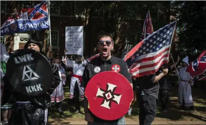  ?? FOTO: ?? EN AV MåNGA GRUPPER. Ku Klux Klan–demonstran­ter i Charlottes­ville, Virginia, tidigare i somras.