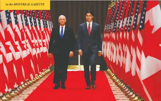  ?? LARS HAGBERG / AFP / GETTY IMAGES ?? U.S. Vice President Mike Pence and Prime Minister Justin Trudeau arrive for a joint press conference in Ottawa, on Thursday, where Trudeau raised the abortion issue.