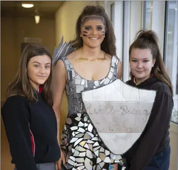  ??  ?? Junk Kouture entries at Loreto Bray: Lucy Callaly the Well-Being Warriorher­design with Olivia Kinnane and Jessica Doyle