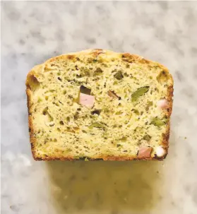  ?? Jessica Battilana ?? This cake salé is made with mortadella and green olives but is very versatile.