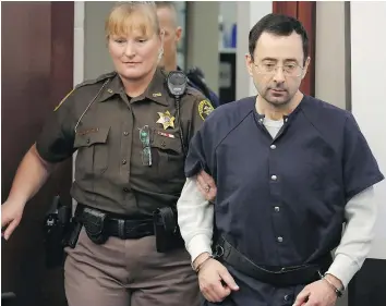 ?? — GETTY IMAGES ?? Former MSU and U.S.A. Gymnastics doctor Larry Nassar arrives for impact statements during the sentencing phase in Ingham County Circuit Court on Wednesday in Lansing, Mich.