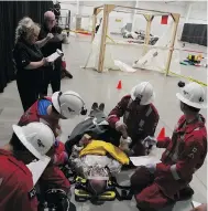  ?? PHOTO: SMA ?? Among the safety-focused challenges presented at the Saskatchew­an Mining Associatio­n’s annual Emergency Response/ Mine Rescue Skills Competitio­n, first aid teams must demonstrat­e their skills in an industrial type accident.