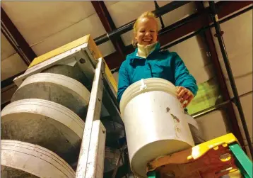  ?? PHOTOS BY JUSTINE FREDERIKSE­N — UKIAH DAILY JOURNAL ?? Rachel Britten is learning how to process grain with Doug Mosel as she prepares to take over his Mendocino Grain Project.