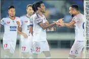  ?? ISL ?? Nandhakuma­r Sekar (No. 22) of Delhi Dynamos celebrates his goal with teammates on Tuesday.