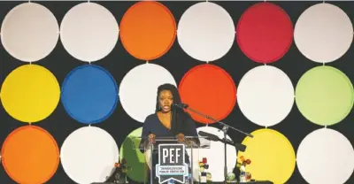  ?? STAFF PHOTO BY C.B. SCHMELTER ?? Daphne Penn speaks during the Public Education Foundation’s 30th Anniversar­y luncheon Wednesday at the Chattanoog­a Convention Center. Penn graduated from Howard School in 2004 and is currently a Harvard University Ph.D. candidate.