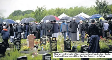  ??  ?? Mourners at the burial of Aneesa Umerji and her children Khadija, Yusuf and Hammaad, at New Overdale Cemetery in Bolton