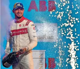  ?? GETTY IMAGES ?? CAPITAL SUCCESS: Jake Dennis celebrates winning the first London E-Prix last month, and he followed that up by finishing runner-up in the second race. Below, Dennis in action in his Avalanche Andretti car