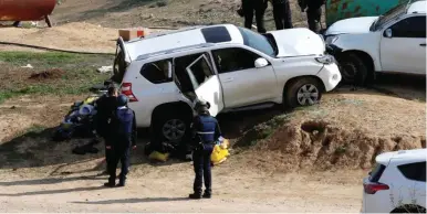  ?? (Reuters) ?? THE CAR DRIVEN by Yacoub Abu al-Kaeean is seen in Umm al-Hiran last year, after it drove into and killed Border Policeman Erez Levi.