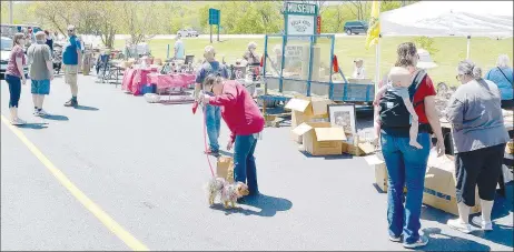  ?? File photo ?? The Bella Vista Historical Museum rented out 14 spaces in its parking lot during the Second Annual Citywide Garage Sale held in April 2019.