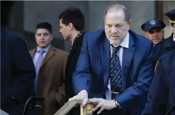  ?? ?? Harvey Weinstein leaves a Manhattan courthouse after closing arguments in his rape trial in New York, Friday, Feb. 14, 2020. New York's highest court has overturned Harvey Weinstein's 2020 rape conviction and ordered a new trial. (AP Photo/Seth Wenig, File)