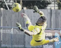  ?? ?? Amadou Tangara makes a flying save
Picture: Lyn Phillips