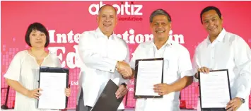  ??  ?? COMMITTED TO EDUCATION. Aboitiz Group believes that a better learning environmen­t helps the youth realize their dreams. Aboitiz Foundation chaiman Erramon Aboitiz (2nd from left) reaffirms its support to DepEd's 'Adopt-a-School' program as it signs MOU...