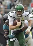  ?? PHELAN M. EBENHACK - THE ASSOCIATED PRESS ?? Jacksonvil­le Jaguars defensive end Dawuane Smoot, back left, sacks New York Jets quarterbac­k Sam Darnold (14) during the first half of an NFL football game, Sunday, Oct. 27, 2019, in Jacksonvil­le, Fla.