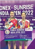  ?? ?? Benyapa Aimsaard, left, and Nuntakarn Aimsaard celebrate with their women’s doubles gold medals in New Delhi.