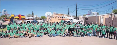  ??  ?? More than 3,700 Comcast employees and their families, friends and community partners took on projects in nine New Mexico cities.