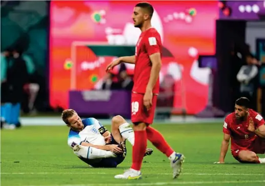  ?? EFE ?? Harry Kane (29) se duele en el suelo tras lesionarse en el partido de debut ante Irán.