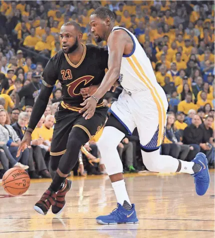  ?? KYLE TERADA/USA TODAY SPORTS ?? LeBron James’ Cavs play the Warriors in a fourth Finals in a row but second for Kevin Durant.