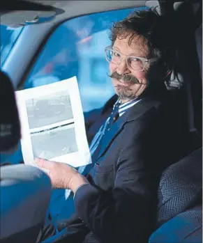  ??  ?? Evidence chain broken: Porirua lawyer Chris Ellis with the fine notice he successful­ly overturned.