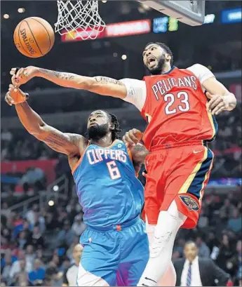  ?? Wally Skalij Los Angeles Times By Broderick Turner ?? ANTHONY DAVIS, who came in averaging 37.2 points and 14.7 rebounds during an eight-game win streak, goes for 41 and 13 against DeAndre Jordan and the Clippers, including six straight clutch points.