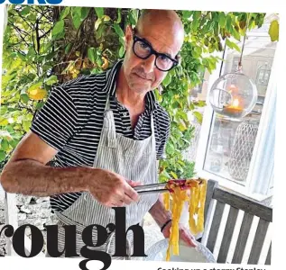  ?? ?? Cooking up a storm: Stanley Tucci enjoying Italian food