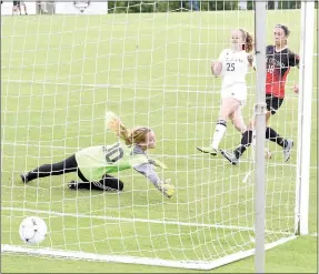  ?? Bud Sullins/Special to the Herald-Leader ?? Siloam Springs junior Megan Hutto, No. 25, watches as her shot goes past Russellvil­le keeper Brit Hillis during Friday’s Class 6A state championsh­ip game. Hutto finished with a goal and two assists in the win against Russellvil­le.