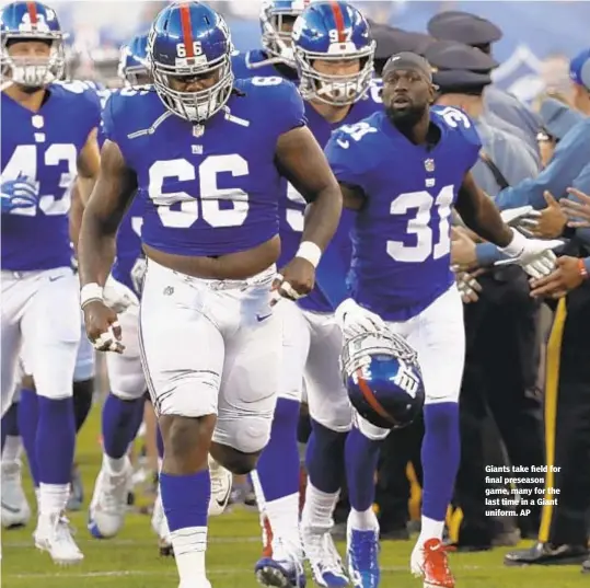  ?? AP ?? Giants take field for final preseason game, many for the last time in a Giant uniform.