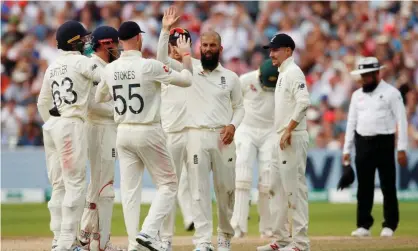  ?? Photograph: Andrew Boyers/Action Images/Reuters ?? Moeen Ali celebrates taking the wicket of Australia’s Tim Paine in 2019.