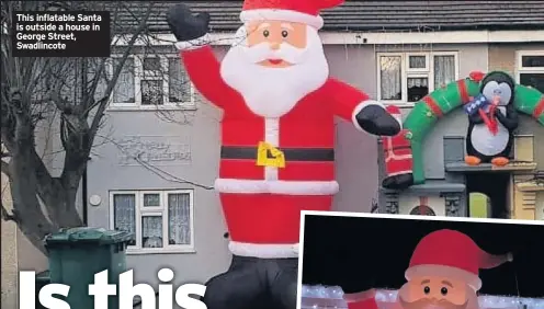  ??  ?? This inflatable Santa is outside a house in George Street, Swadlincot­e