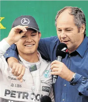  ?? BILD: SN/GEPA/WEISGRAM ?? Gerhard Berger konnte sich mit Nico Rosberg freuen – nicht nur, weil er den nächsten Vertrag für den neuen Weltmeiste­r aushandelt­e.