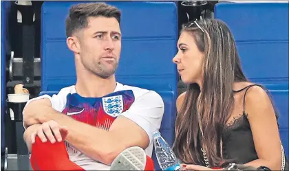  ??  ?? Gary Cahill and wife Gemma Acton following England’s quarterfin­al victory over Sweden in Russia