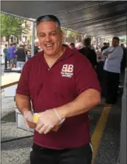  ?? EVAN BRANDT — DIGITAL FIRST MEDIA ?? Adam Sager from The Butcher and the Barbecue on North Charlotte Street, was among many local eatery owners putting their best food forward during Sunday’s 13th annual Carousel of Flavor.