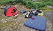  ??  ?? This pile of rubbish and discarded camping gear is an example of rubbish often abandoned at Glen Etive.